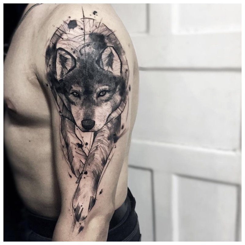 Pui de lup dragut - tatuaj pe umarul unui barbat