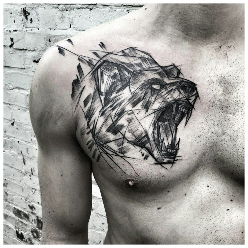 Gyvūnas - tatuiruotė ant vyro krūtinės